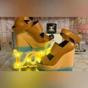 EUC.
Brown and Blue Wooden Platform Wedge Sandals.